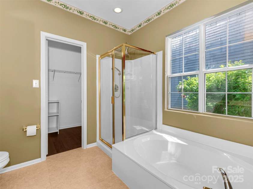 2825 Redfield Drive, Charlotte, NC 28270.  MLS# CAR4253533, YatesRealty ID 26913. Primary bathroom (virtually enhanced)