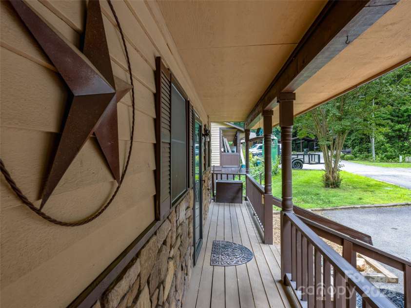 128 View De Lake Drive, Etowah, NC 28729.  MLS# CAR4274148, YatesRealty ID 26919. Convenient covered front porch