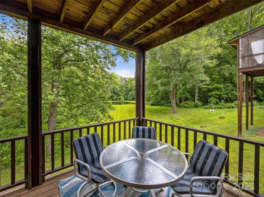 128 View De Lake Drive, Etowah, NC 28729.  MLS# CAR4274148, YatesRealty ID 26919. Lower Level Deck with access to pond and park area