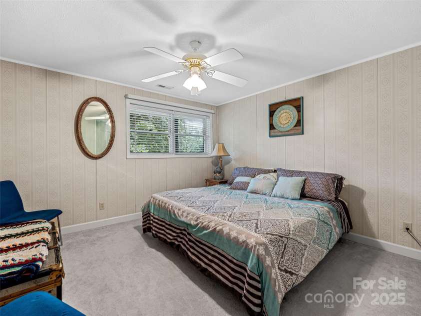128 View De Lake Drive, Etowah, NC 28729.  MLS# CAR4274148, YatesRealty ID 26919. Lower Level Guest bedroom