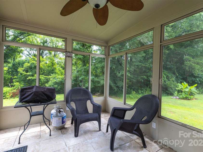 1206 Bottle Brush Lane, Harrisburg, NC 28075.  MLS# CAR4279213, YatesRealty ID 26923. Screened Porch