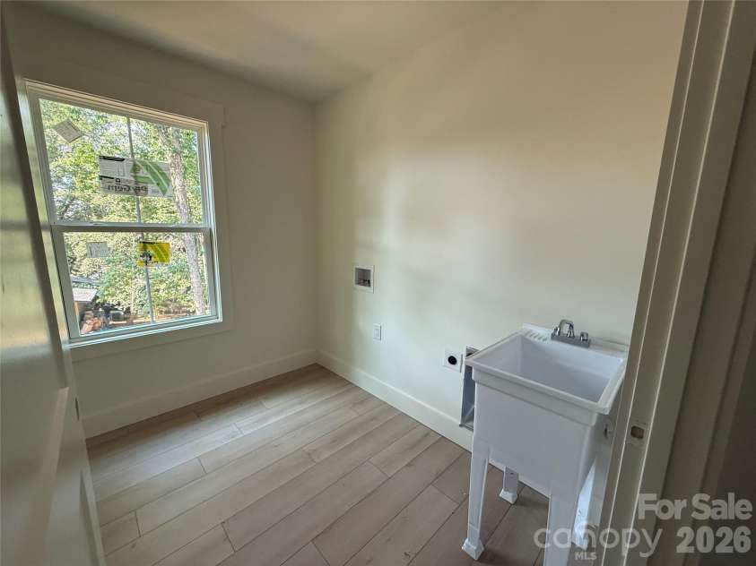 5069 Tara Tea Drive, Tega Cay, SC 29708.  MLS# CAR4388227, YatesRealty ID 26928. Laundry Room