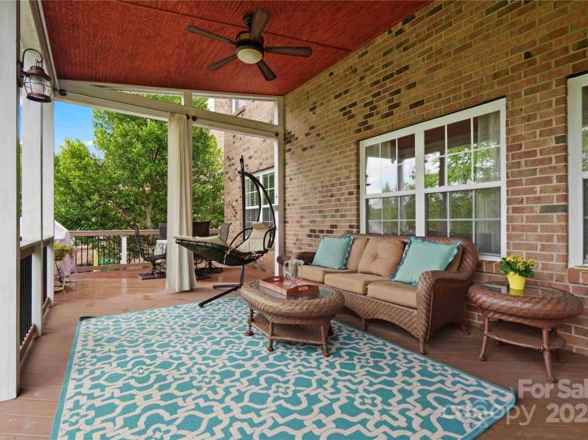 422 Deer Brush Lane, Waxhaw, NC 28173.  MLS# CAR4253488, YatesRealty ID 26930. Covered Back deck is very private