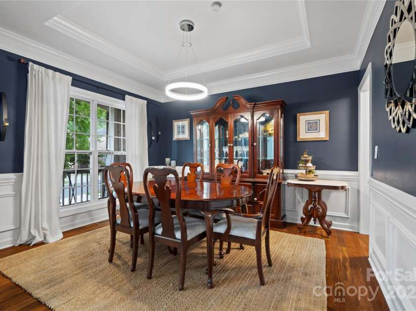 422 Deer Brush Lane, Waxhaw, NC 28173.  MLS# CAR4253488, YatesRealty ID 26930. Formal Dining room has a tray ceiling and hardwoods