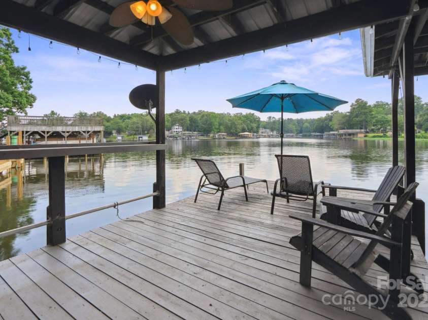612 Berry Hill Drive, Norwood, NC 28128.  MLS# CAR4267025, YatesRealty ID 26932. Sitting Area At Boat House