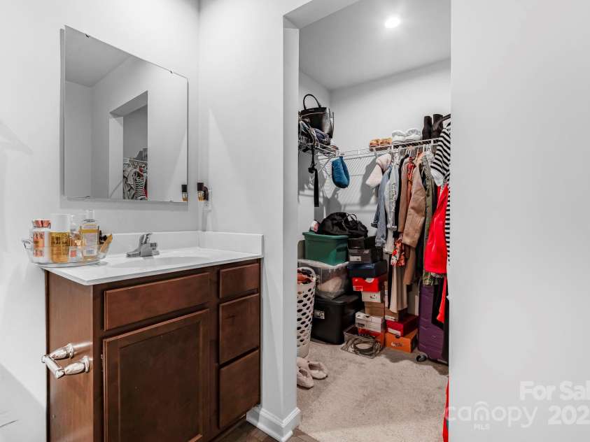 2051 Langer Street, Charlotte, NC 28214.  MLS# CAR4245334, YatesRealty ID 26938. Primary bathroom and walk-in closet