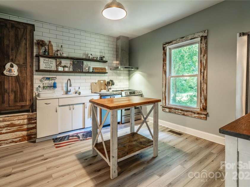 175 Shadow Spring Lane, Salisbury, NC 28144.  MLS# CAR4282292, YatesRealty ID 26943. Charming kitchen with new appliances - island conveys!