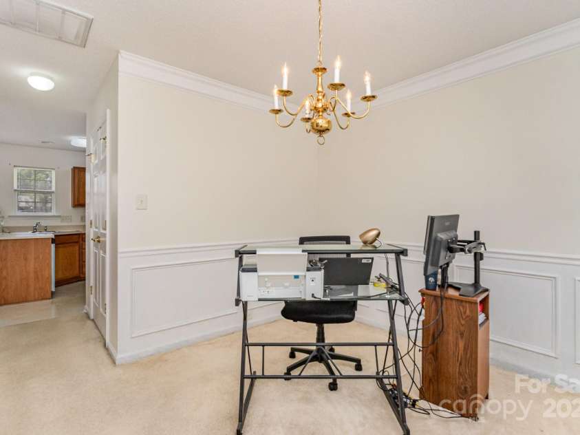 10506 Gold Pan Road, Charlotte, NC 28215.  MLS# CAR4280921, YatesRealty ID 26948. Formal dining room has upgraded moldings - currently used as office by seller