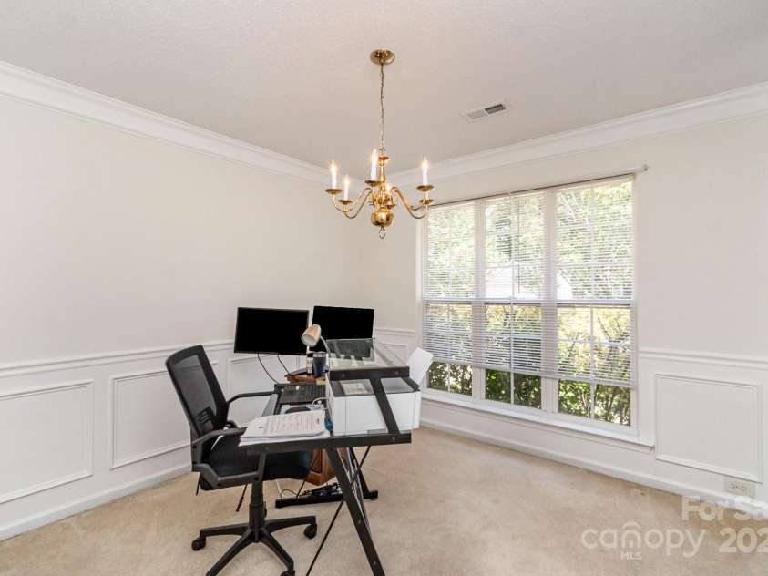 10506 Gold Pan Road, Charlotte, NC 28215.  MLS# CAR4280921, YatesRealty ID 26948. Formal dining room is currently used as an office