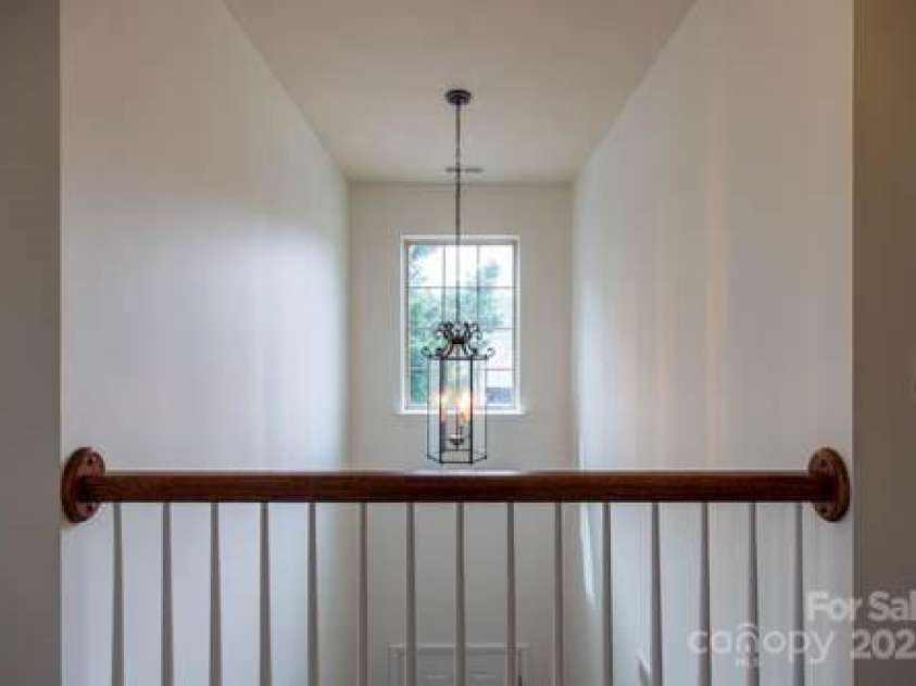 159 Saye Place, Mooresville, NC 28115.  MLS# CAR4255738, YatesRealty ID 26952. Chandelier over Two Story Foyer