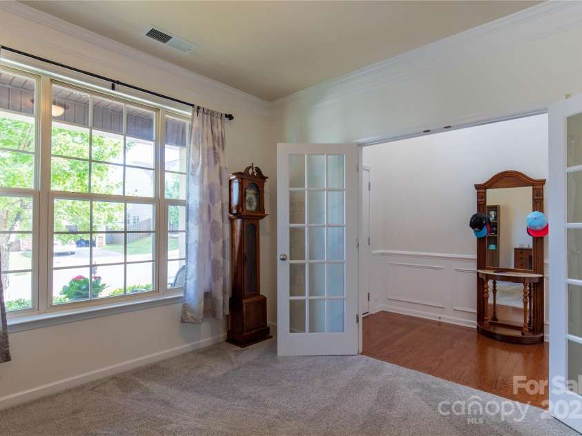 159 Saye Place, Mooresville, NC 28115.  MLS# CAR4255738, YatesRealty ID 26952. Large windows let in natural light to Office