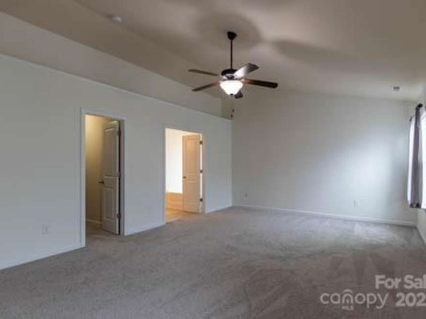 159 Saye Place, Mooresville, NC 28115.  MLS# CAR4255738, YatesRealty ID 26952. Oversized Primary Bedroom with Vaulted Ceiling