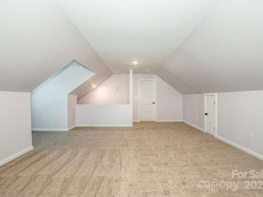 7039 Executive Circle, Denver, NC 28037.  MLS# CAR4275891, YatesRealty ID 26953. Bonus room at top of stairs