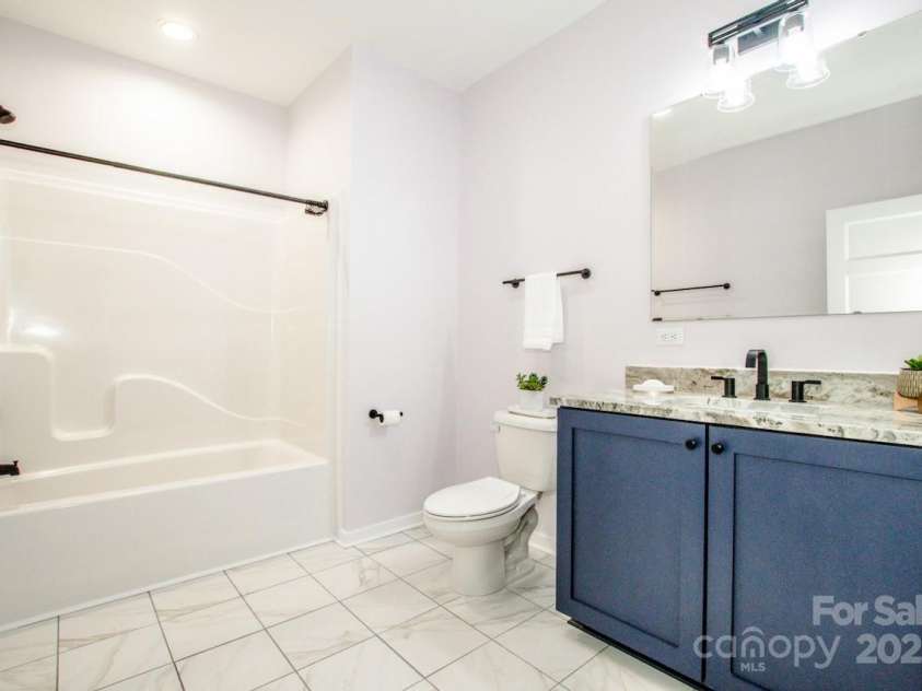 7039 Executive Circle, Denver, NC 28037.  MLS# CAR4275891, YatesRealty ID 26953. Hall Bathroom