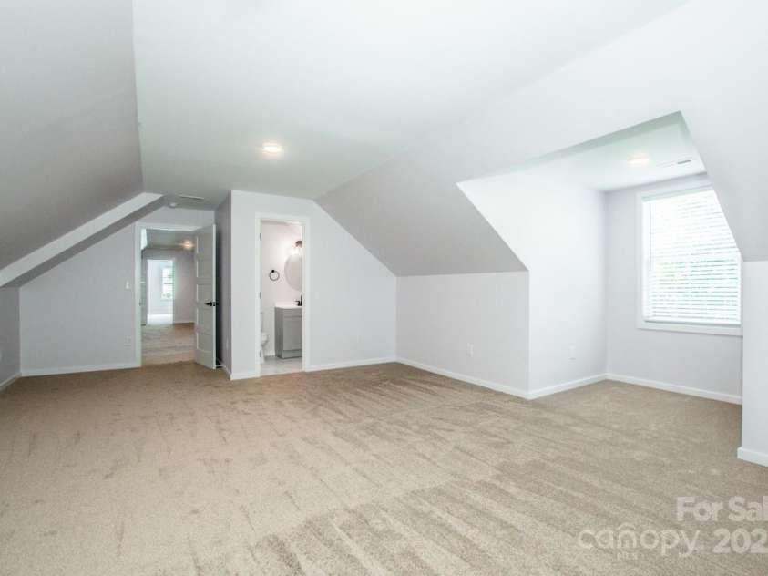 7039 Executive Circle, Denver, NC 28037.  MLS# CAR4275891, YatesRealty ID 26953. Large up stairs flex space # 1 with half bath