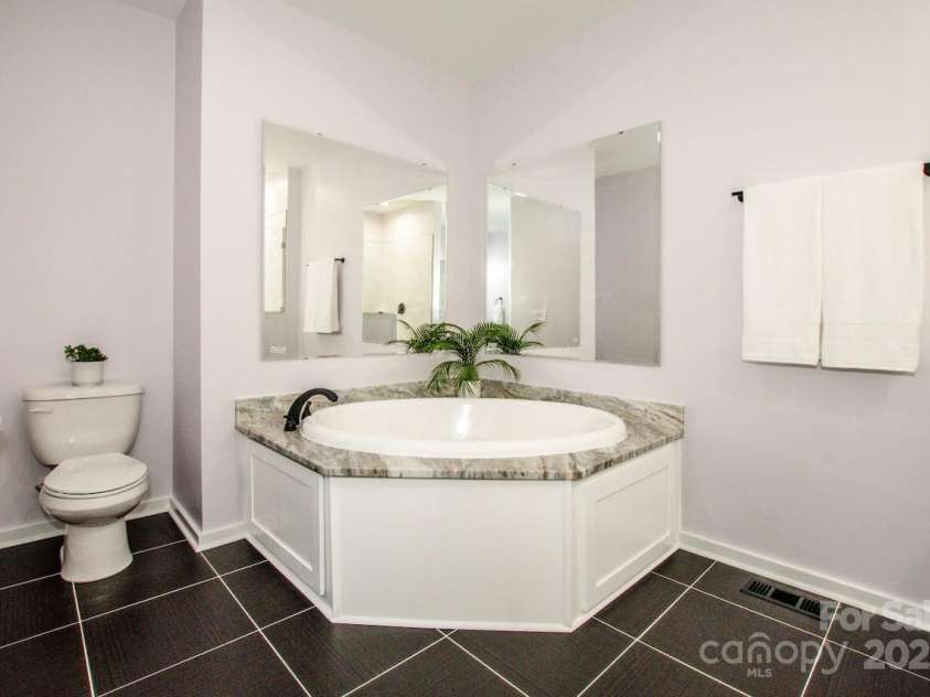 7039 Executive Circle, Denver, NC 28037.  MLS# CAR4275891, YatesRealty ID 26953. Primary bath soaking tub