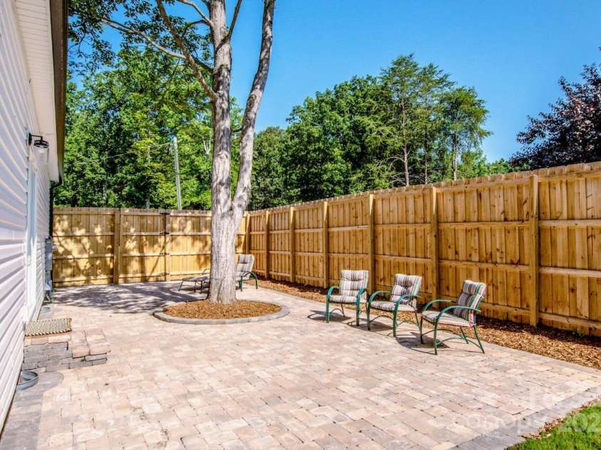 7039 Executive Circle, Denver, NC 28037.  MLS# CAR4275891, YatesRealty ID 26953. Private fenced backyard with large paver patio