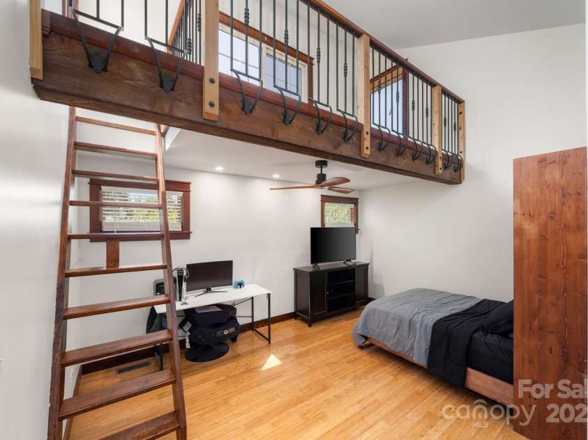 15 Deaver Drive, Asheville, NC 28806.  MLS# CAR4280300, YatesRealty ID 26958. Primary Bedroom with Loft and Balcony