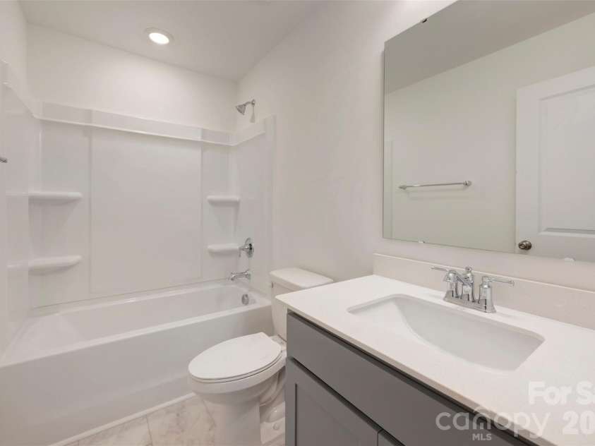 1727 Boulder Ridge Drive, Gastonia, NC 28052.  MLS# CAR4347089, YatesRealty ID 26958. Second floor bathroom