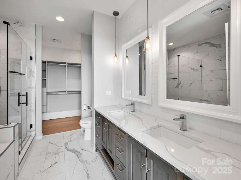 7 Patton Avenue, Asheville, NC 28801.  MLS# CAR4302588, YatesRealty ID 2697. Primary bathroom with double sinks
