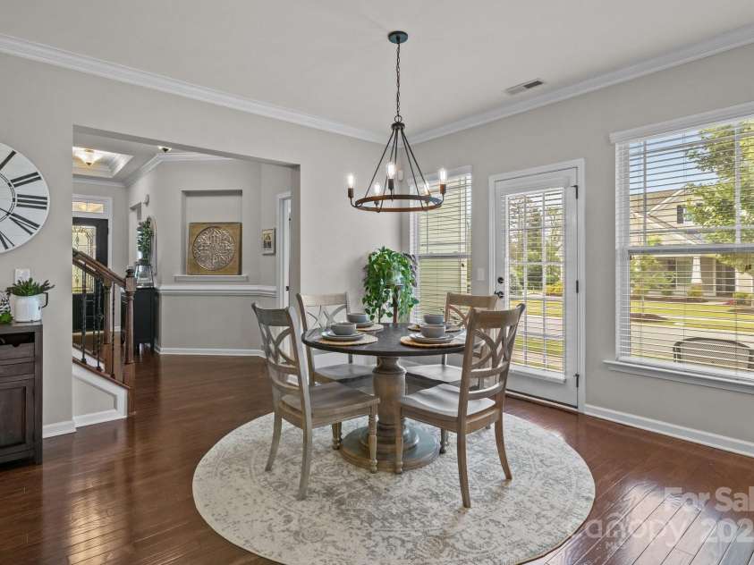 16034 Rushwick Drive, Huntersville, NC 28078.  MLS# CAR4262990, YatesRealty ID 26972. Breakfast area leads to side coffee porch