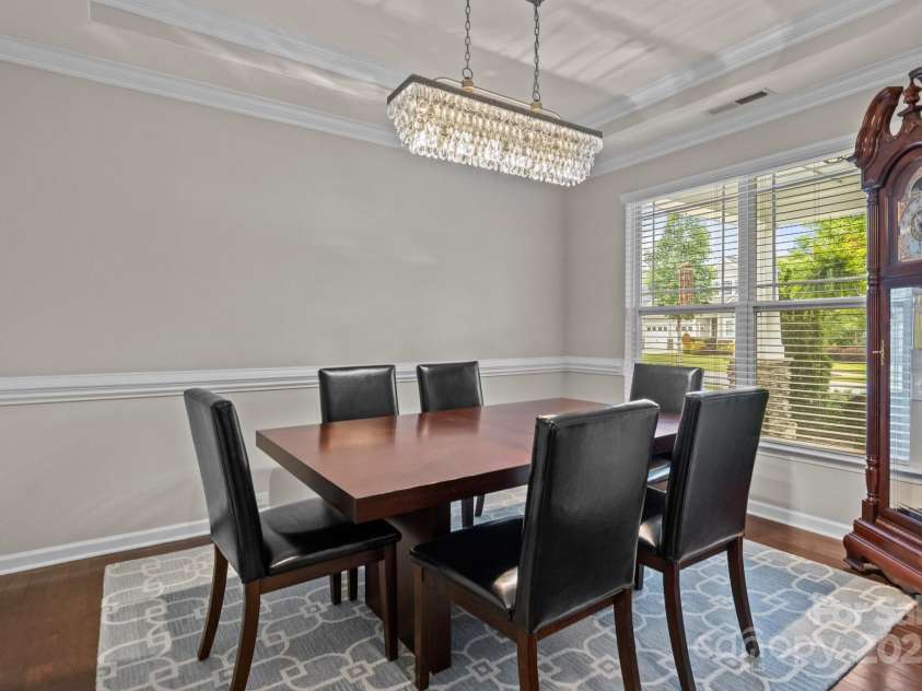 16034 Rushwick Drive, Huntersville, NC 28078.  MLS# CAR4262990, YatesRealty ID 26972. Dining room w/ tray ceiling detail to match