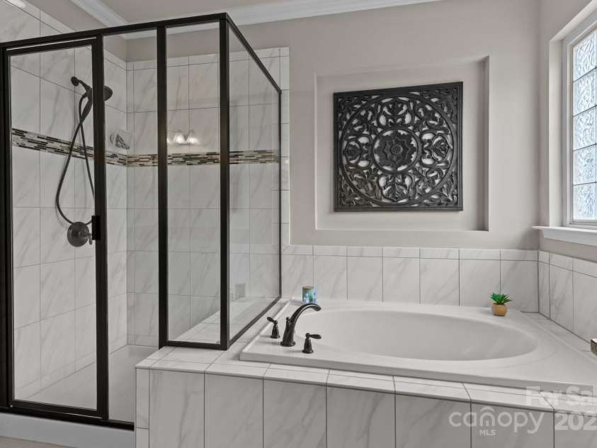 16034 Rushwick Drive, Huntersville, NC 28078.  MLS# CAR4262990, YatesRealty ID 26972. Primary bath with soaking tub & separate shower