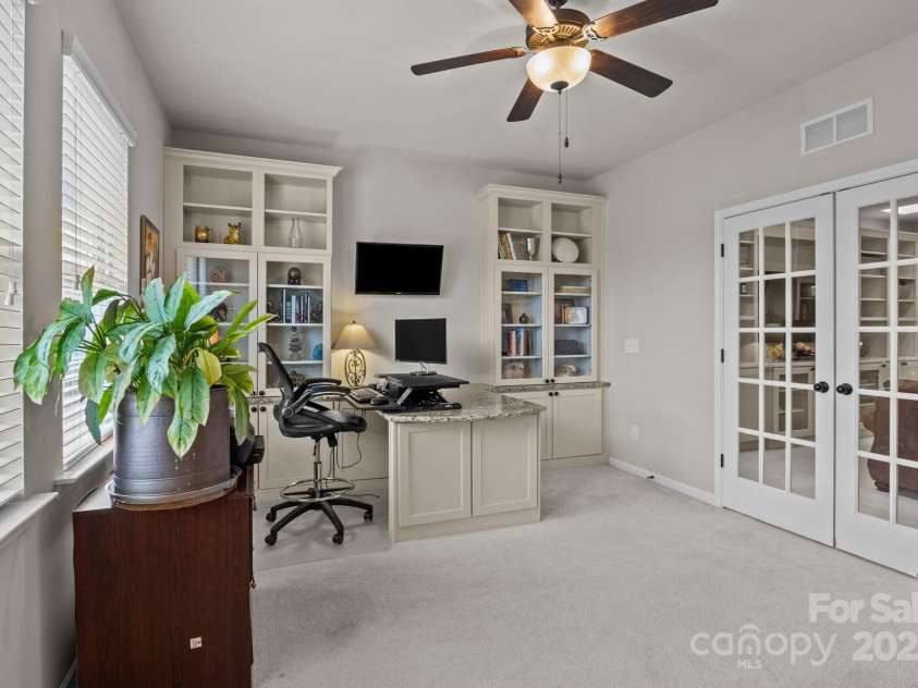 16034 Rushwick Drive, Huntersville, NC 28078.  MLS# CAR4262990, YatesRealty ID 26972. Study w/ built-in cabinets & desk area