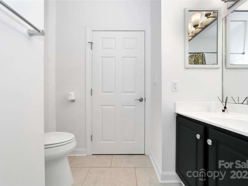 99 Ridgetop Circle, Brevard, NC 28712.  MLS# CAR4282824, YatesRealty ID 26984. Second bathroom in the hallway by the kitchen and second bedroom. New plumbing fixtures including the 