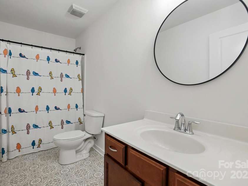 7166 Dove Field Lane, Fort Mill, SC 29707.  MLS# CAR4259041, YatesRealty ID 26985. Guest bath