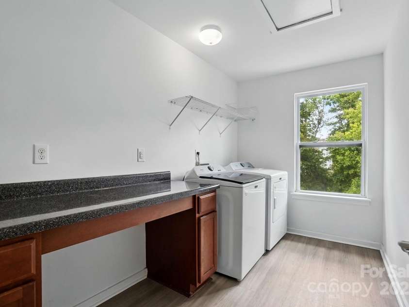 7166 Dove Field Lane, Fort Mill, SC 29707.  MLS# CAR4259041, YatesRealty ID 26985. Laundry with built in