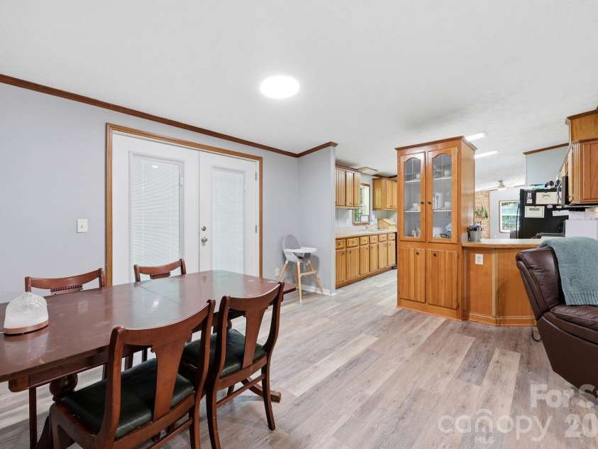 545 Campbell Road, Woodleaf, NC 27054.  MLS# CAR4382649, YatesRealty ID 26988. Pic from dining to kitchen.