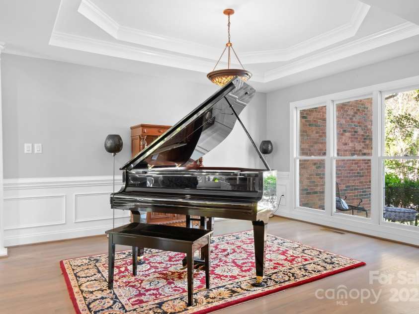 16033 Agincourt Drive, Huntersville, NC 28078.  MLS# CAR4313163, YatesRealty ID 2699. Dining Room being used as piano room. 