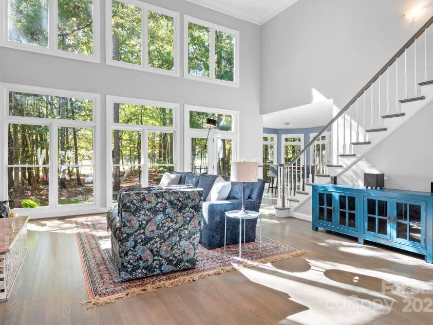 16033 Agincourt Drive, Huntersville, NC 28078.  MLS# CAR4313163, YatesRealty ID 2699. Soaring floor to ceiling windows in Great Room