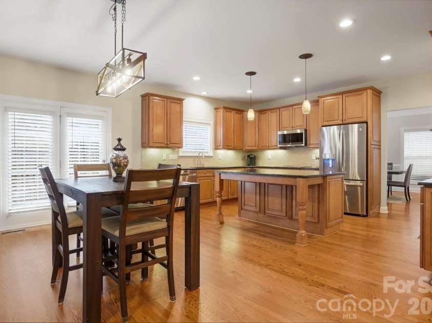 905 Patricians Lane, Wesley Chapel, NC 28110.  MLS# CAR4347178, YatesRealty ID 2699. Large breakfast area. Extra bar stool seating.