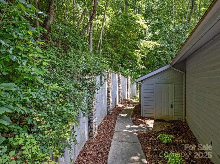 150 Sondley Parkway, Asheville, NC 28805.  MLS# CAR4280880, YatesRealty ID 26990. Side Yard, Shed Conveys