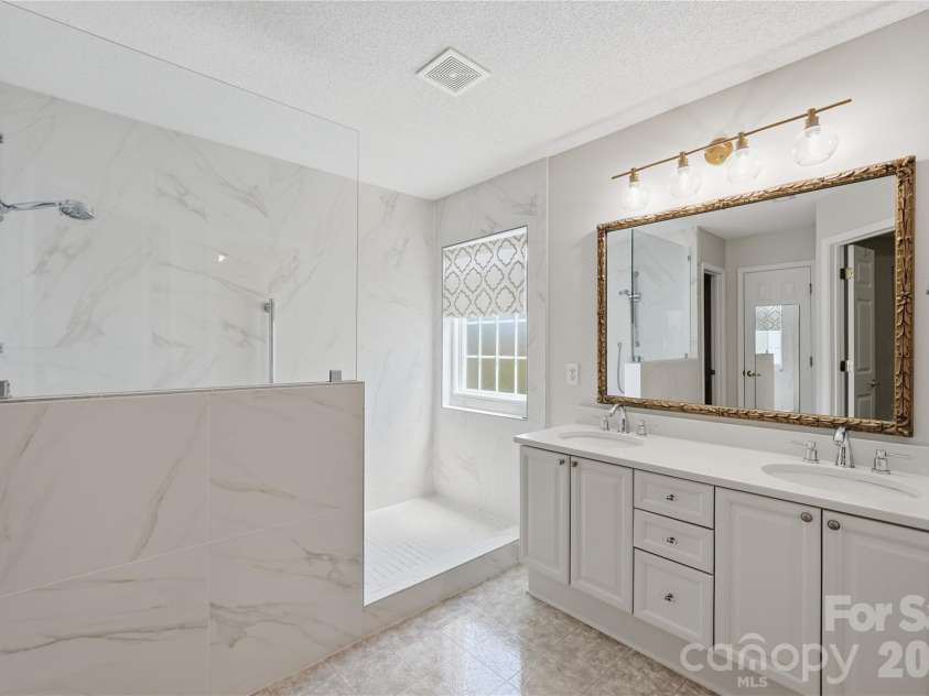 157 Lighthouse Road, Mount Holly, NC 28120.  MLS# CAR4379658, YatesRealty ID 26991. Primary bathroom 
