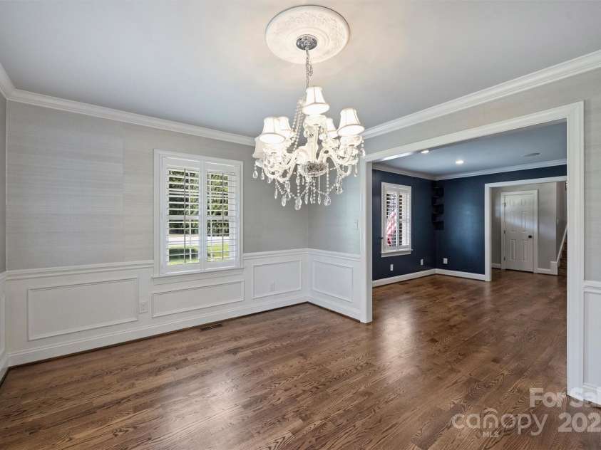 1008 Dumbarton Road, Gastonia, NC 28054.  MLS# CAR4275369, YatesRealty ID 26994. Dining room with picture frame molding and crown molding.