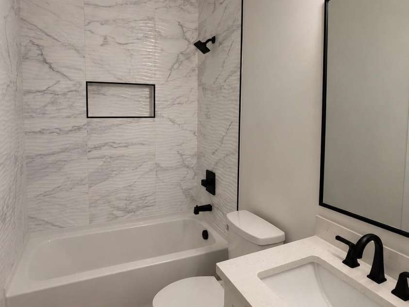 317 Tamarind Drive, Troy, NC 27371.  MLS# CAR4388084, YatesRealty ID 26996. Hall Bathroom