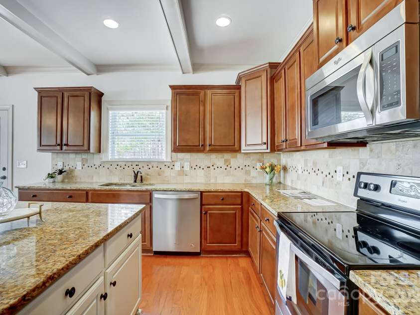 5006 Sand Trap Court, Monroe, NC 28112.  MLS# CAR4225761, YatesRealty ID 26996. Chef's kitchen