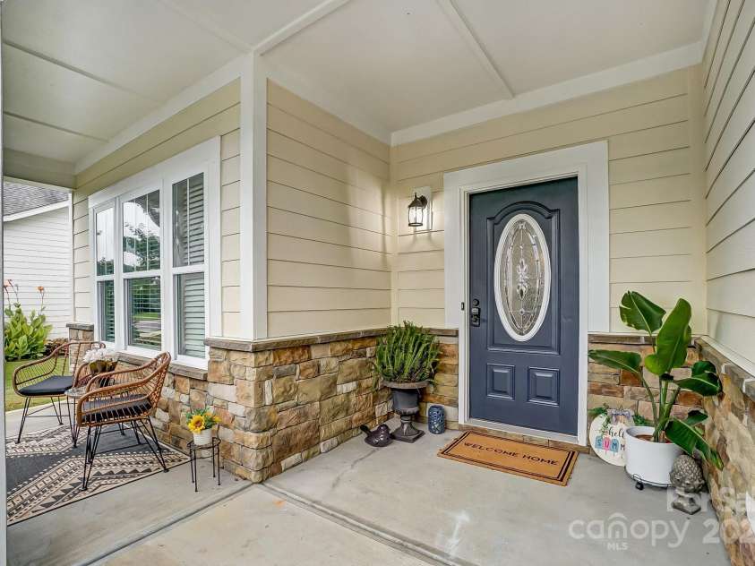 5006 Sand Trap Court, Monroe, NC 28112.  MLS# CAR4225761, YatesRealty ID 26996. Covered front porch