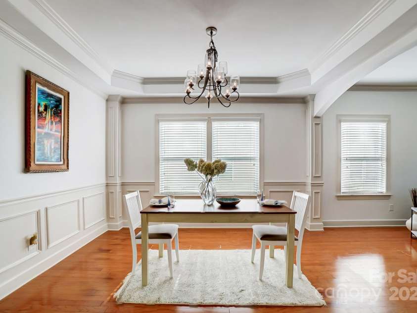 5006 Sand Trap Court, Monroe, NC 28112.  MLS# CAR4225761, YatesRealty ID 26996. Dining rm can fit a 12 person table