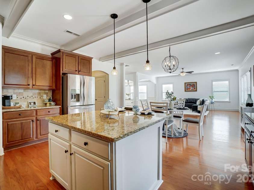 5006 Sand Trap Court, Monroe, NC 28112.  MLS# CAR4225761, YatesRealty ID 26996. Kitchen with living rm view