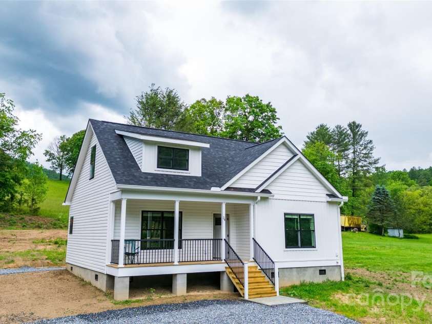 24 Queen Annes Drive, Tuckasegee, NC 28783.  MLS# CAR4259573, YatesRealty ID 26999. 