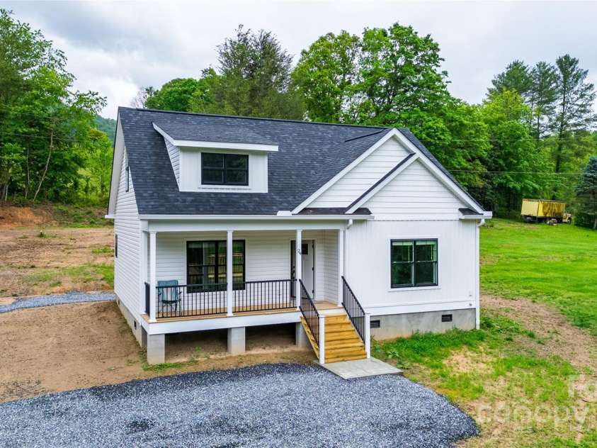 24 Queen Annes Drive, Tuckasegee, NC 28783.  MLS# CAR4259573, YatesRealty ID 26999. 