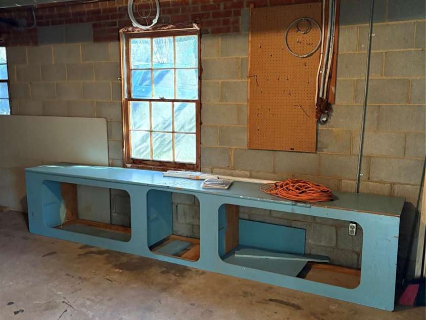 5806 Whitingham Drive, Charlotte, NC 28215.  MLS# CAR4263834, YatesRealty ID 27000. Additional storage in unfinished area of the baszpemebt. More storage shelving in basement. Great for crafts, tool work or storage.