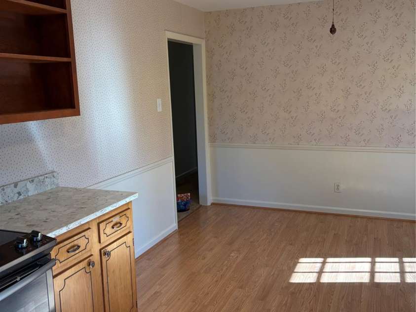 5806 Whitingham Drive, Charlotte, NC 28215.  MLS# CAR4263834, YatesRealty ID 27000. Entry to kitchen from hallway. 