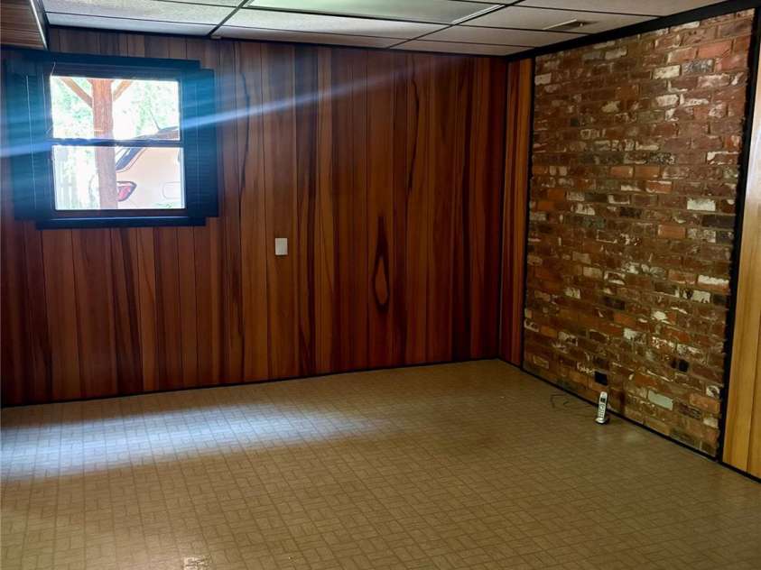 5806 Whitingham Drive, Charlotte, NC 28215.  MLS# CAR4263834, YatesRealty ID 27000. Flex room with window view. Lower level.