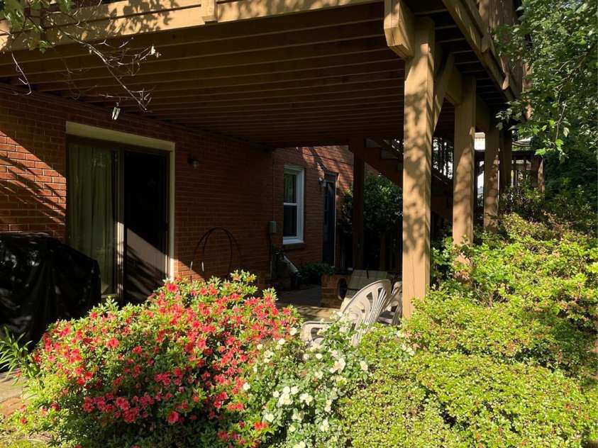 5806 Whitingham Drive, Charlotte, NC 28215.  MLS# CAR4263834, YatesRealty ID 27000. View of outdoor entertaining areas from the side of the patio and deck.