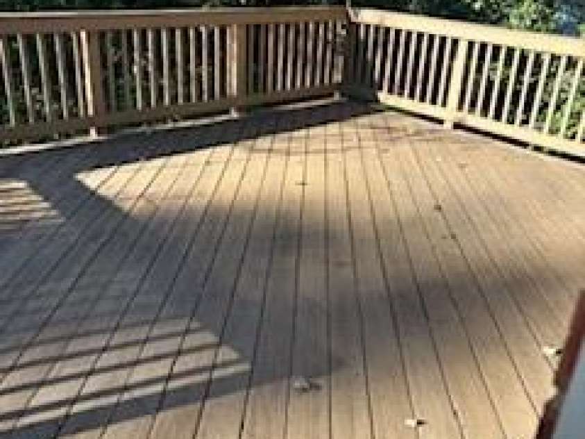 5806 Whitingham Drive, Charlotte, NC 28215.  MLS# CAR4263834, YatesRealty ID 27000. View of upper level deck, with access from the kitchen and stairs that lead to the lower patio.